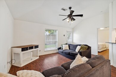 This spacious living room is equipped with 10ft ceilings!