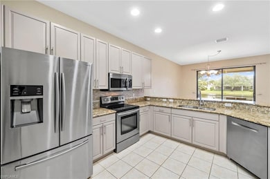 15662 Summit Place Cir unit 385, Naples, FL 34119 - photo 6