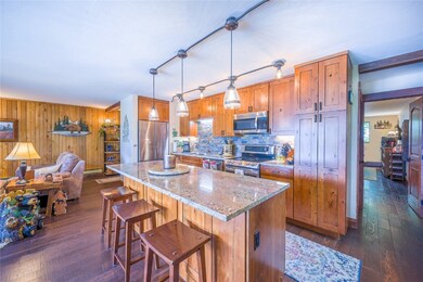 Kitchen featuring a center island, appliances with