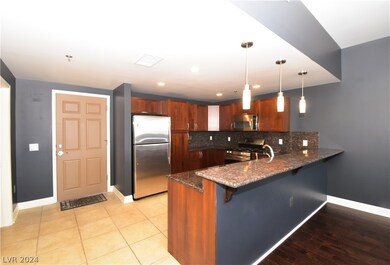Entry foyer. powder bath on left as well as coat c