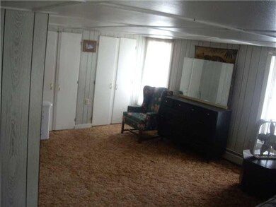 Exterior Front. One of many large rooms upstairs. 