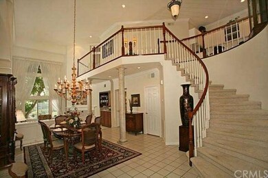 Soaring Ceilings and a Grand Staircase in the Form