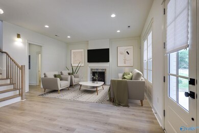 Gorgeous high ceilings make this space so much fun to decorate.  Add paintings and great furniture and you have a winner!