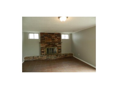 Family Room, Garage Level, Has Patio Door out to Y