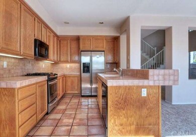 Kitchen boasts stainless steel appliances.