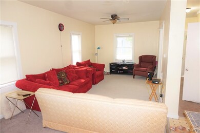 The ample living room offers plenty of space for f