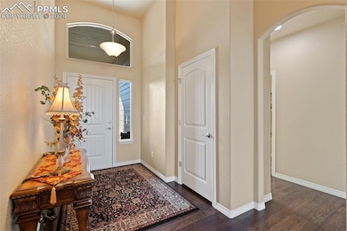 Welcome into this lovely, vaulted entryway with cl