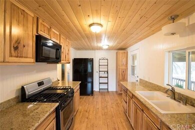 Updated kitchen with custom hickory cabinets