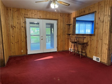 Formal Dining Room, doors lead to rear screened in