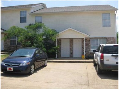 Exterior Front. Covered entryways. solid construction, and convenient to everywhere!