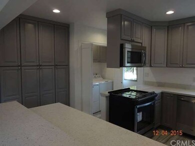 NEW laundry room with New washer/dryer located con