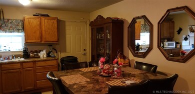 Eat in kitchen from living room. Back door to back