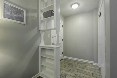 Entry hallway includes a front closet