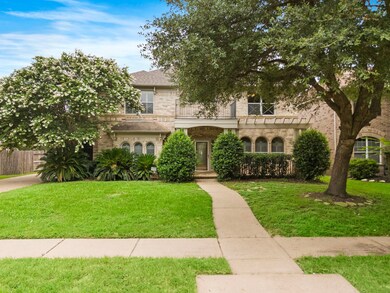 This charming two-story brick home features a well