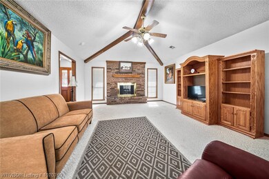 Large family room with gas log fireplace