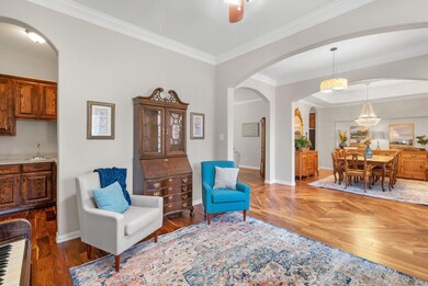 Living room featuring a tiled slate fireplace, cro