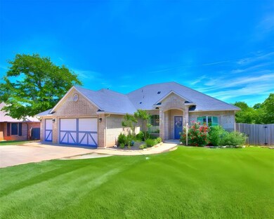 Ranch-style home with driveway, brick siding, fenc
