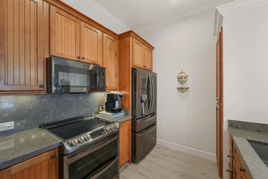 Another view of this functional & spacious kitchen