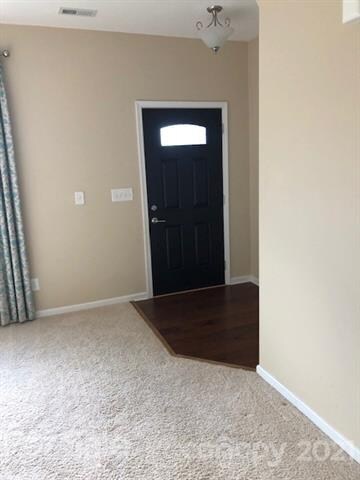 Foyer area with coat closet