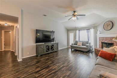 Back door leads to your extended covered patio