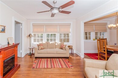 The home features oak flooring throughout, and has