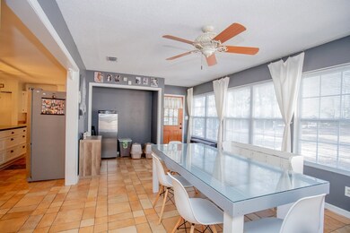 Sunroom / They are using as Dining Area