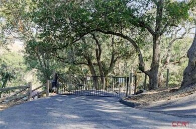 Fully fenced with electric gate for added privacy.