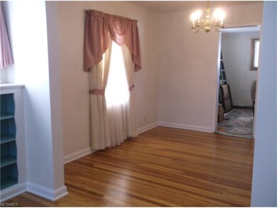 Formal Dining Room has hardwood floors and fresh p