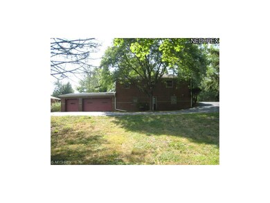 Rear View i- 3 car gar, walkout bsmt.