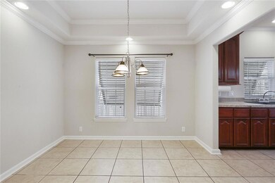 DINING AREA FEATURES TRAY CEILING OVERSIZE ENTRANC