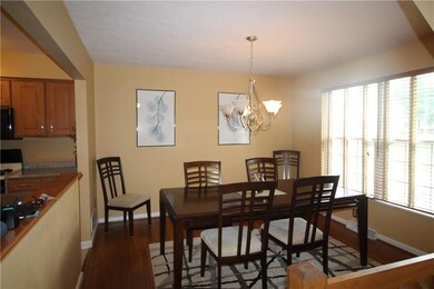 formal dining room open to kitchen.
