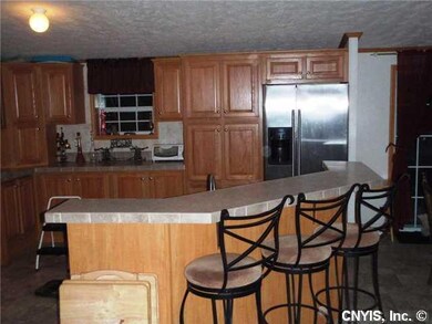 Kitchen. You can eat at the breakfast bar or opt f