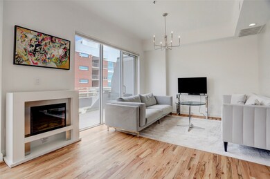 The 11x12 SF living room has custom lighting. Hard