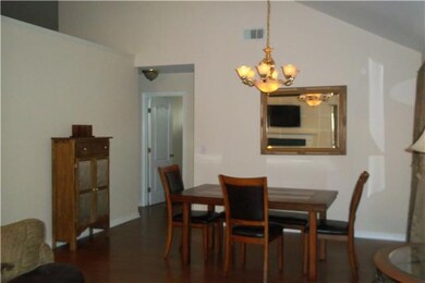 SPACIOUS FORMAL DINING ROOM WILL HOLD A LARGE   TABLE FOR 8 OR MORE, PLUS OTHER FURNITURE.