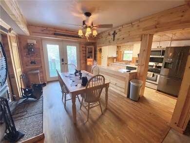 Dining area with original hardwood flooring