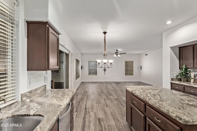 KITCHEN OVERLOOKS FAMILY ROOM