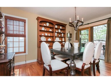 Formal dining area with slider to shady rear deck
