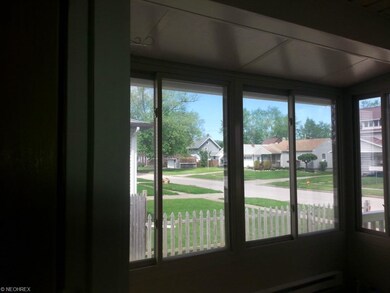 Heated enclosed front porch.
