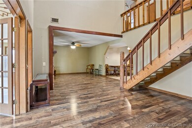 looking into living room from foyer entrance