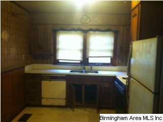 House needs TLC but great kitchen with oak cabinet