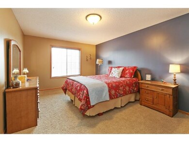 Spacious master bedroom with walk-in closet and pl