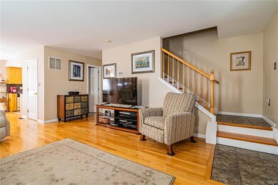 living room from corner facing stairs