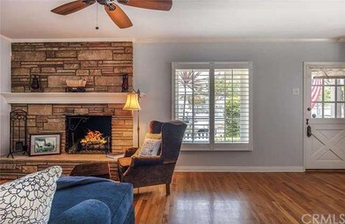 Living room view #3 with beautiful stoned fireplac