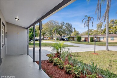 26'x5' Roofed Front Porch welcomes you to Front En