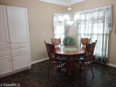 Breakfast. Note - built-in cabinets on left for extra storage plus panty in adjoining kitchen