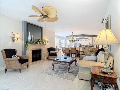Living room with light tile patterned floors, ceil
