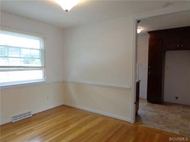 Dining room looking into the kitchen.