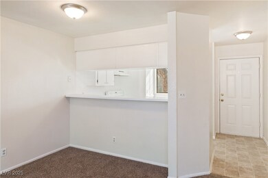 Kitchen featuring breakfast bar / kitchen passthro