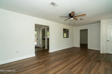 Front Room to Kitchen and Family Room