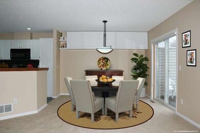 Dining Area with sliding glass door to deck and bu